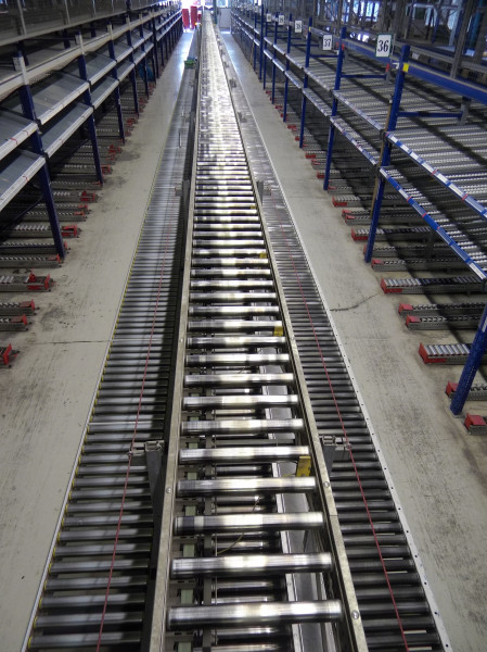 Full line Dematic 84180 mm order picking system with empty crates accumulating roller conveyor with flow racks